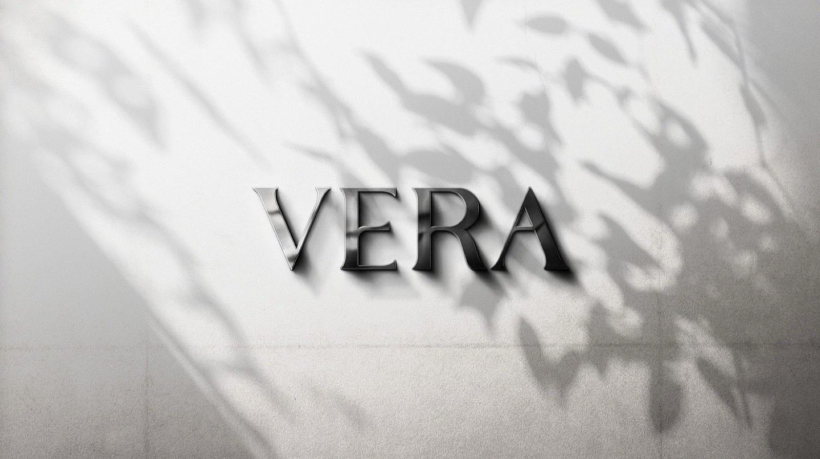 ตราสัญลักษณ์ VERA PROPERTY บนพื้นผิวหินอ่อน